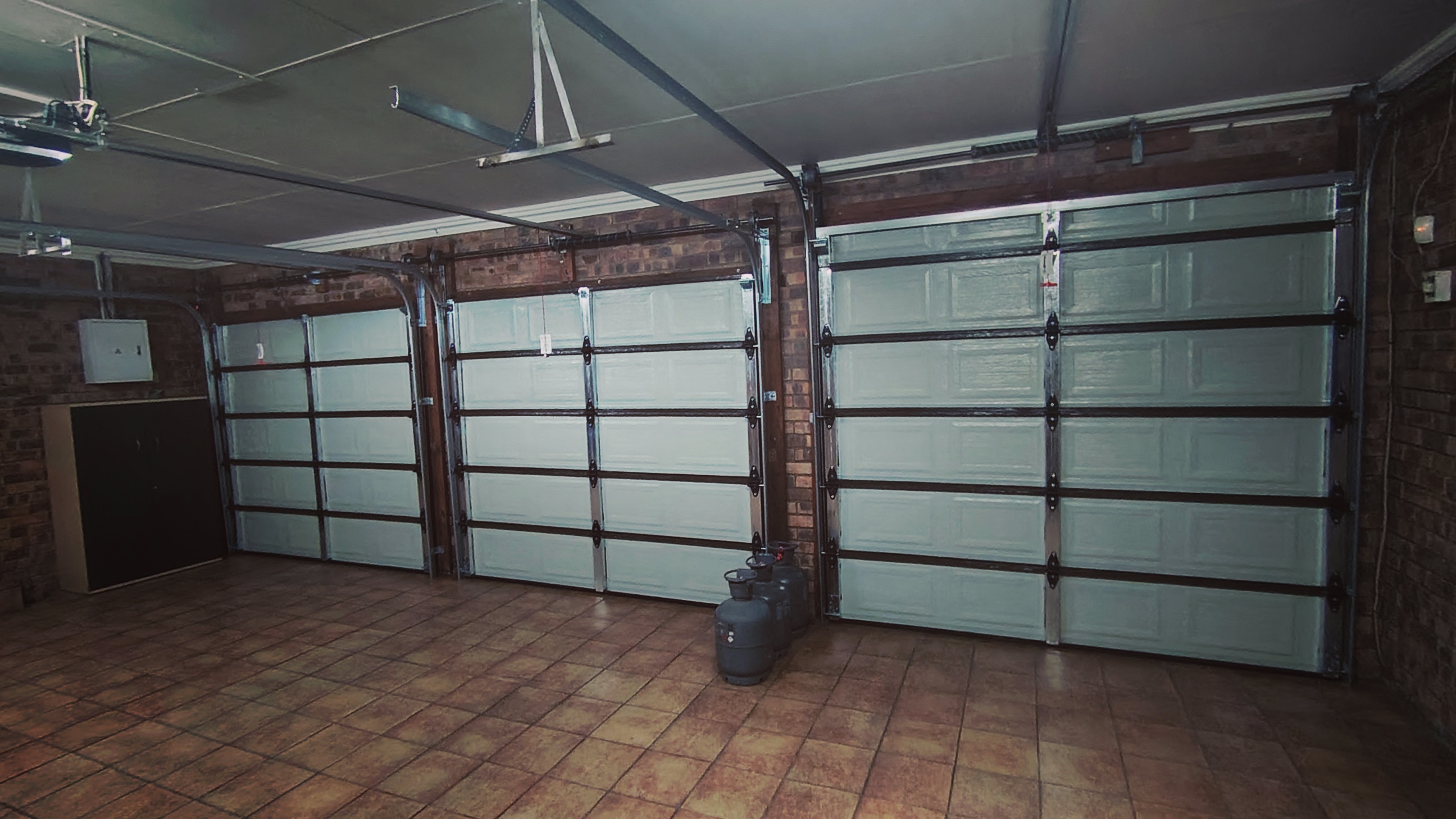 Interior view showing neat sectional door installation workmanship
